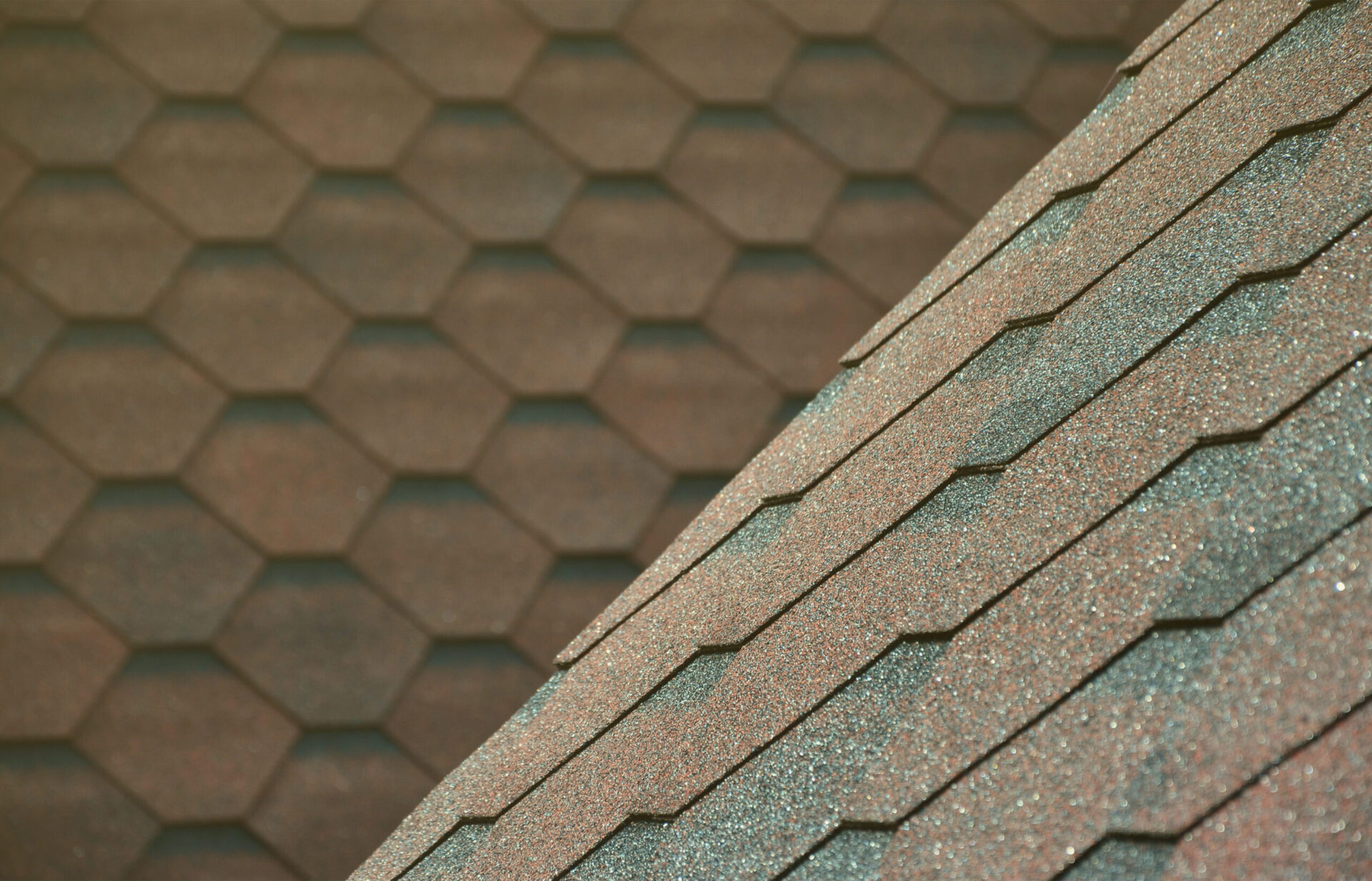 The texture of the roof with asphalt shingles. Waterproof roofing